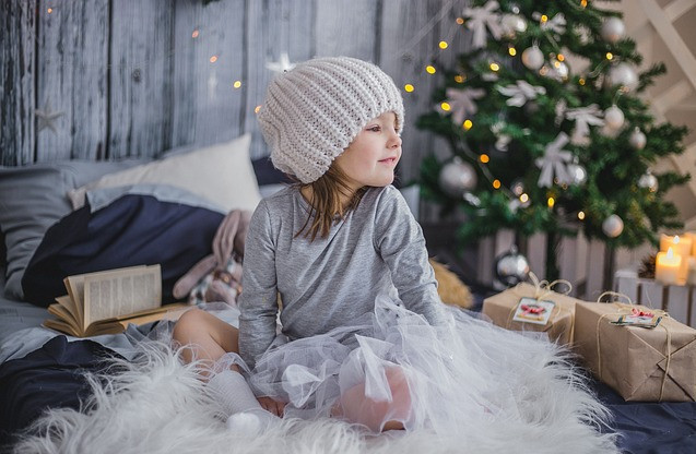 a 3-year-old girl with presents